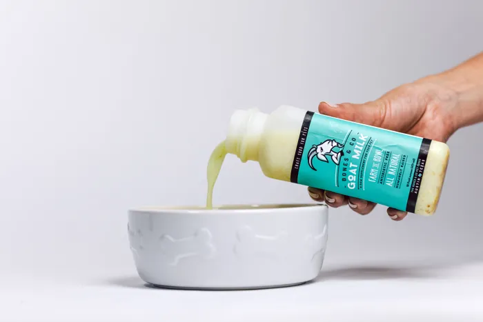 Bones & Co Goat Milk 64-ounce bottle pouring
